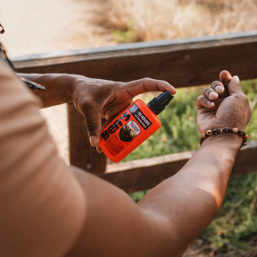 Ben's 100 Tick and Insect Repellent 3.4 oz. Pump Spray spraying on man's arm