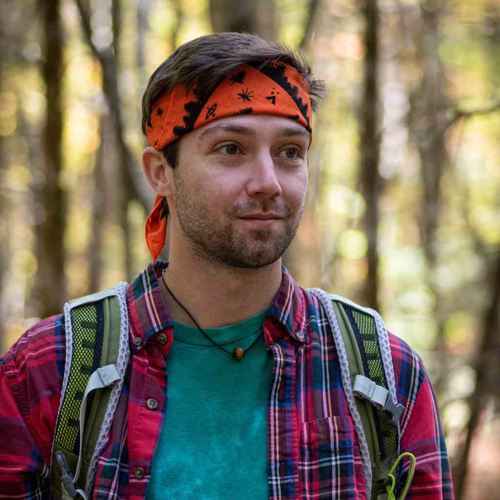 Ben's Tick & Insect Repellent Bandana with Insect Shield man wearing on head while hiking